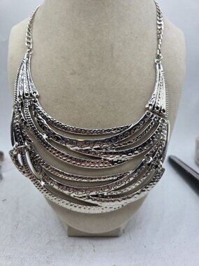 Layered Silver-Tone Bib Necklace With Ornate Detailing